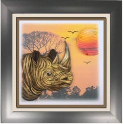 Framed rhino art and sunset