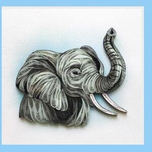 Black and white quilled elephant artwork.