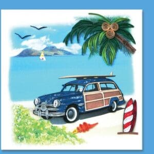 Surfboards and palm tree by the ocean