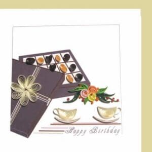 Gift box with chocolates and teacups