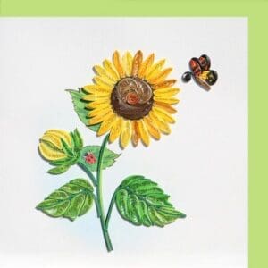 Intricate quilling of sunflower and butterfly