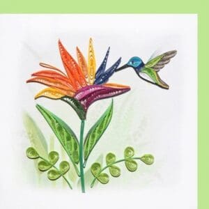 Intricate quilling art with hummingbird and flower