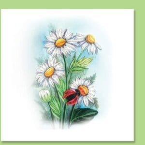 Intricate quilling of flowers and ladybug