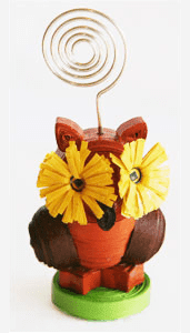 Wooden owl ornament with metal spiral