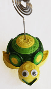 Colorful quilled turtle with googly eyes