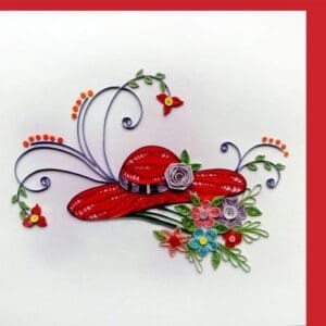 Decorative quilled flowers and red hat