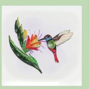 Colorful paper quilled bird and blossom